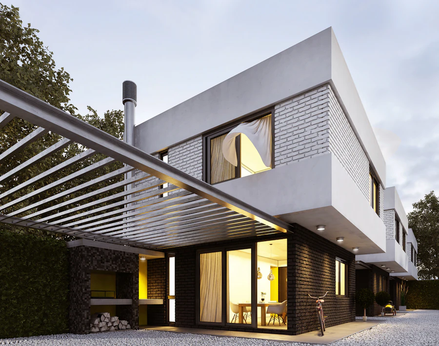 White cantilevered modern house with a timber pergola and warm lit interiors at dusk