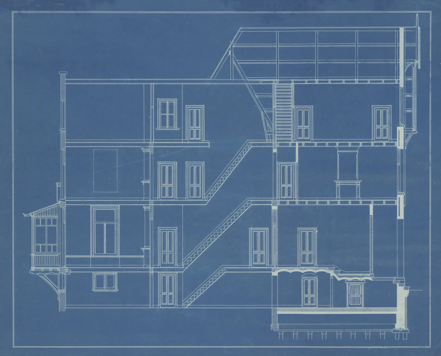 Blue architectural blueprint with a building section and elevation